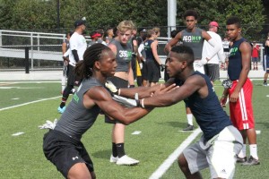 Plant City's Antoine Thompson (left) getting in work at E7