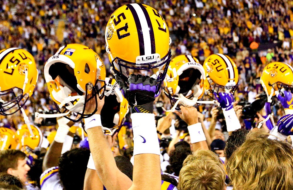 Oct 17, 2015; Baton Rouge, LA, USA; LSU Tigers players celebrate a win against the Florida Gators in a game at Tiger Stadium. LSU defeated Florida 35-28. Mandatory Credit: Derick E. Hingle-USA TODAY Sports